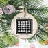 25 Days Of Christmas Personalities Sublimation Transfer, decorative wooden ornament with various Halloween-themed skull faces and expressions hanging on a Christmas tree.