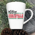 Merry Christmas Stacked Sublimation Transfer, Christmas-themed coffee mug with holiday design amid pinecones and festive greenery.