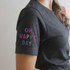 Oh Happy Day POCKET/MASK Screen Print Heat Transfer, colorful lettering on the sleeve of a dark gray shirt.