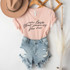 Um, Love that Journey For Me Screen Print Heat Transfer, pink T-shirt with motivational quote and distressed denim shorts on hanger.