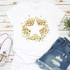 Gold Metallic Stars Sublimation Transfer, white T-shirt with gold star and circle design.