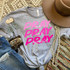 Stacked Pray Pink Screen Print Transfer, pink text on a gray t-shirt with prayer phrases.