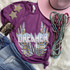 Dreamer Screen Print Heat Transfer, purple t-shirt with a colorful winged design and the word 'DREAMER' printed on it.