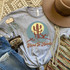 Hard To Handle Screen Print Heat Transfer, a graphic design of a cactus with the text 'Hard To Handle' on a gray T-shirt with accessories and a hat around it.