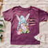 Happy Easter Gnomies YOUTH Screen Print Heat Transfer, kids' t-shirt featuring a cute gnome with bunny ears, holding carrots, with Easter and spring design.