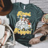 Road Trippin' Screen Print Heat Transfer, graphic t-shirt with mountain, van, and camping scene for travel lovers.