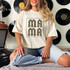 Leopard Print MAMA Screen Print Heat Transfer on a woman's T-shirt, featuring the words 'MAMA' with a leopard pattern.
