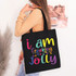 I Am Freaking Jolly Screen Print, colorful graphic tote bag with the phrase 'I am Freaking Jolly' and decorative ornaments.