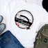 I'm a Hooker On the Weekends Fishing Humor Sublimation Transfer T-shirt, white t-shirt with a graphic of a fish and fishing rod with playful text design.