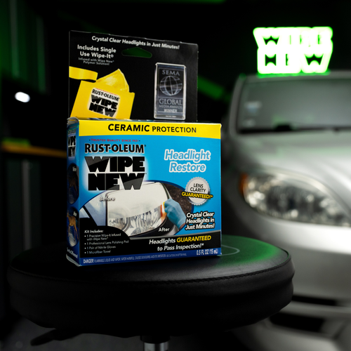 Product packaging of Wipe New Headlight Restore with ceramic protection, displayed in front of a vehicle