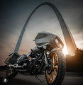 Harley FLH Bagger front crash bar (Road Glide, Street Glide, Road King) installed, showing replaceable Delrin sliders and gloss black powdercoat finish Harley FLH Bagger front crash bar (Road Glide, Street Glide, Road King) installed, showing replaceable Delrin sliders and gloss black powdercoat finish
