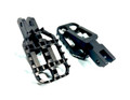 Close-up of CNC-machined Grabber Foot Pegs in black anodized aluminum
