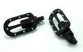 Pair of black powder-coated steel Gripper adjustable foot pegs with multiple grip options, fit Harley clevis mounts 1984-2017.