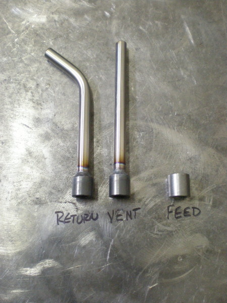 Straight and bent oil tank tubes for vent and return line placement