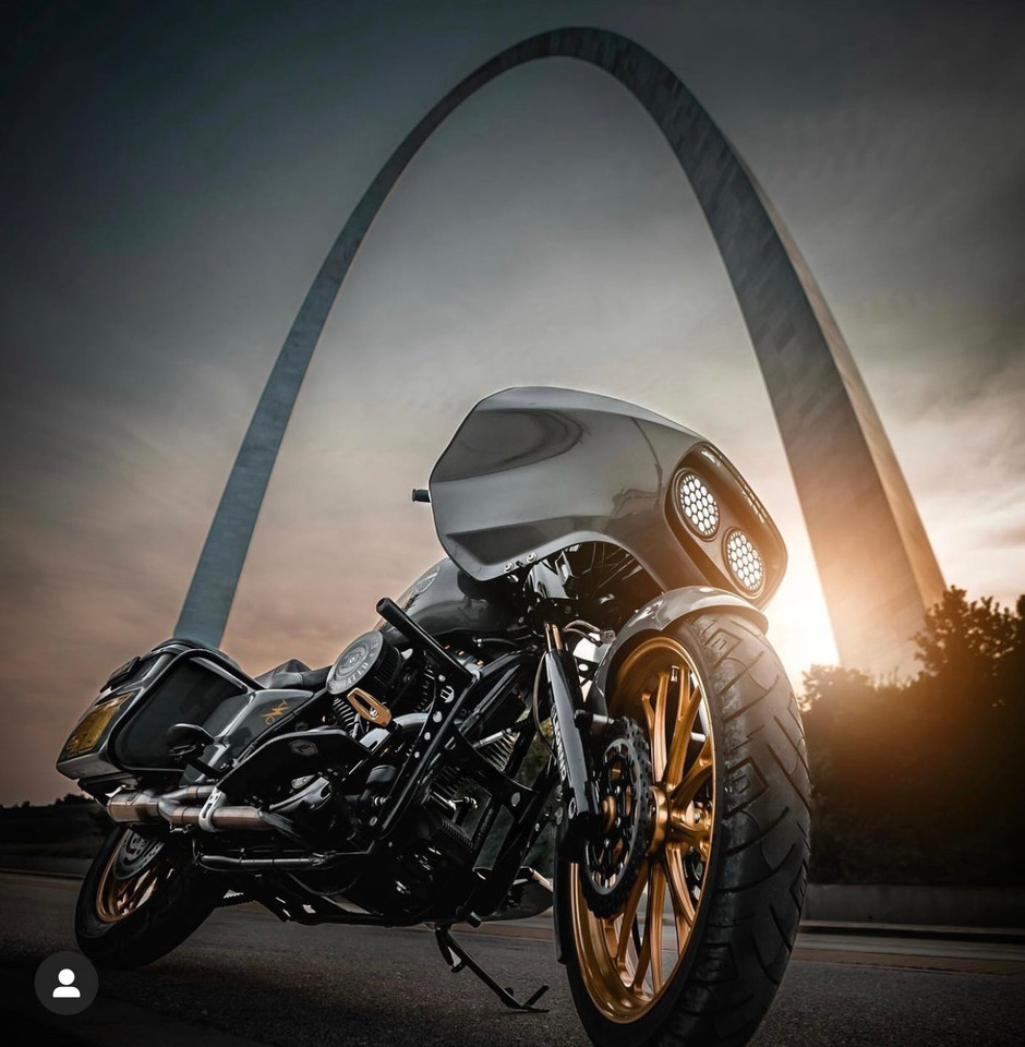 Harley FLH Bagger front crash bar (Road Glide, Street Glide, Road King) installed, showing replaceable Delrin sliders and gloss black powdercoat finish Harley FLH Bagger front crash bar (Road Glide, Street Glide, Road King) installed, showing replaceable Delrin sliders and gloss black powdercoat finish