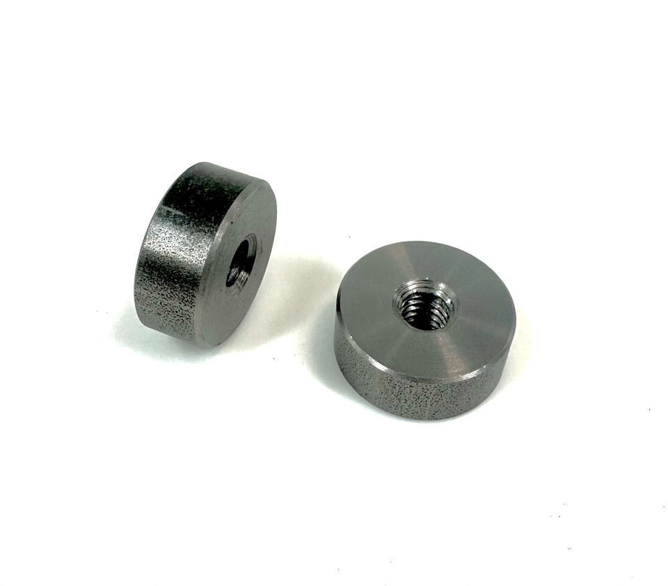 Steel seat pan mounting bung for custom motorcycles, 1" OD and tapped for standard hardware, ideal for securing springs or pivot points.