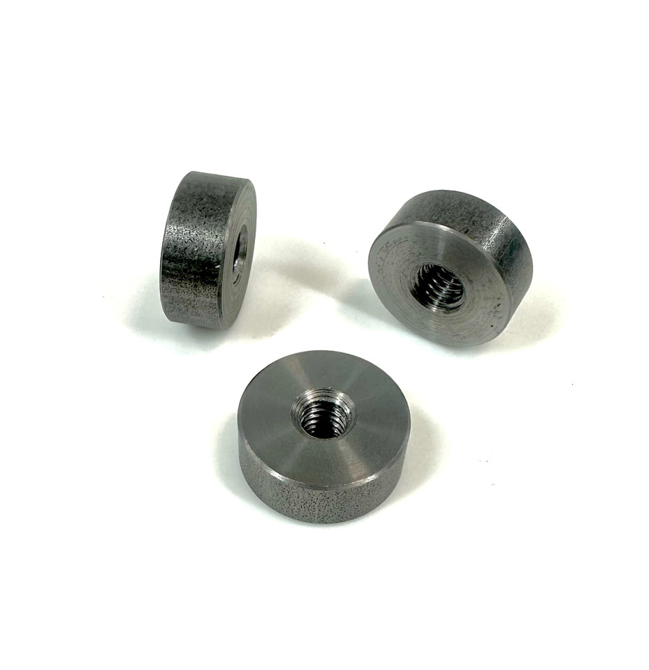 Weld-on seat pan bung made from 1-inch cold rolled steel, tapped for 3/8"-16 or 5/16"-18 thread, used for custom motorcycle seat mounts.