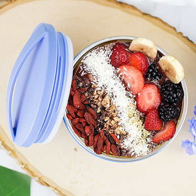 Check Out The New Wave Enviro Safe Bowl Picture of a Blue New Wave Enviro Safe Bowl with yogurt and fruit in it.