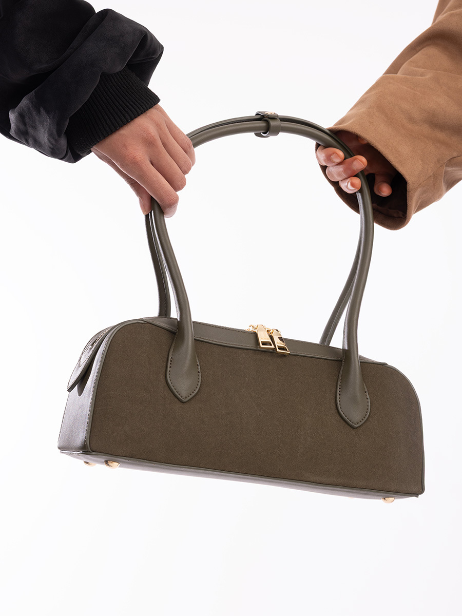 Fall/Winter 2026 vegan fashion collection featuring eco-friendly crossbody bags, satchel handbags, apparel, and belts for modern everyday style.