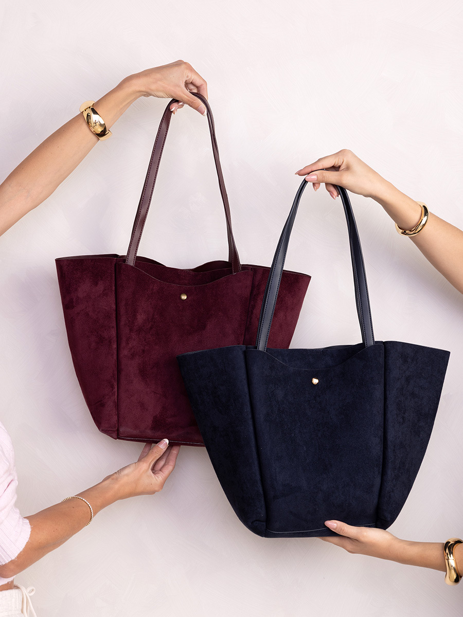 Eco-friendly vegan leather crossbody bags, satchel handbags, apparel, and fashion belts from the Jen & Co. Fall/Winter 2026 collection.