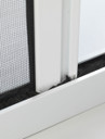 Fly screen cassette frame blends in with white UPVc windows