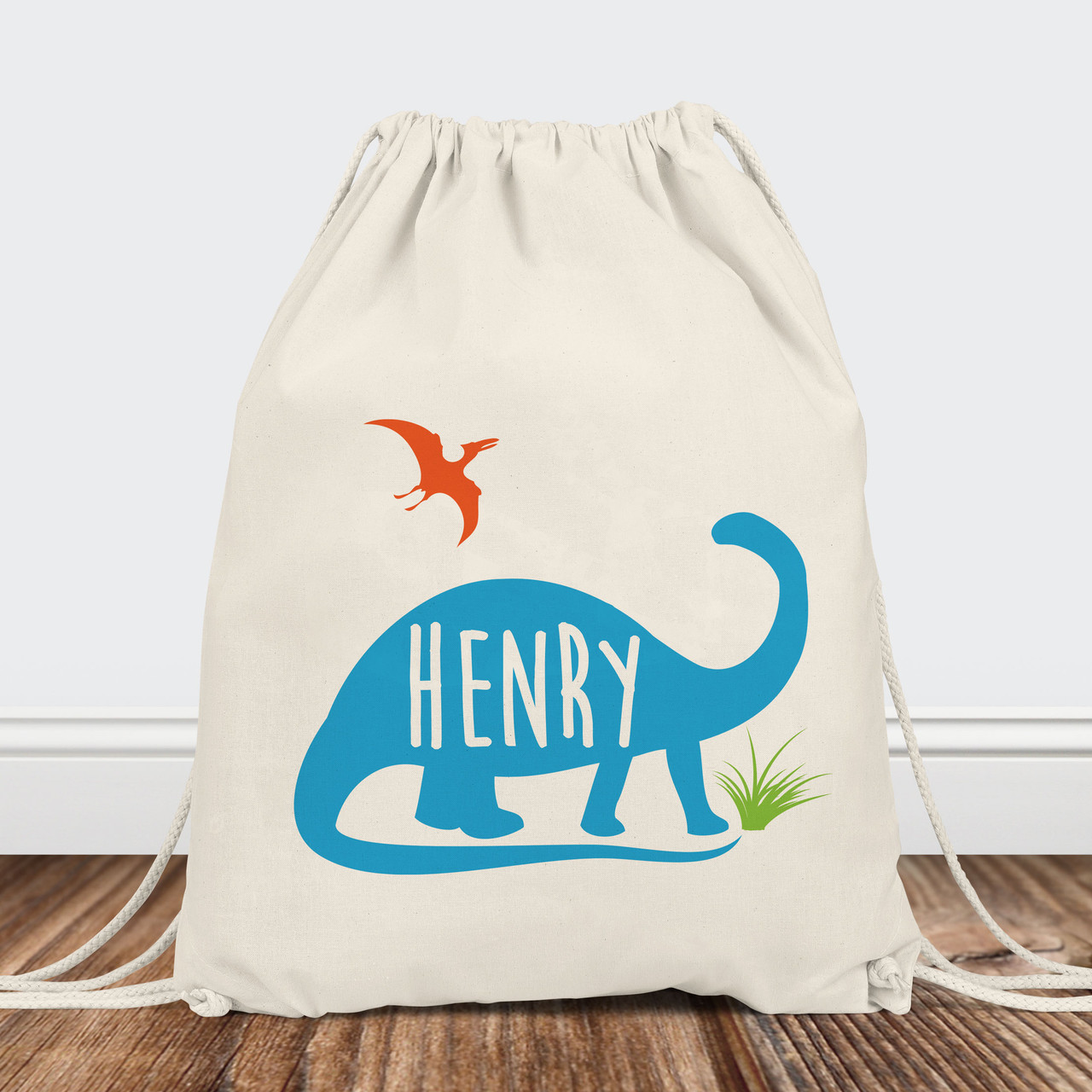 https://cdn11.bigcommerce.com/s-5grzuu6/images/stencil/1280x1280/products/2908/48343/Dinosaur_Kids_Personalized-Drawstring-Backpack-Blue__33025.1654554582.jpg?c=2
