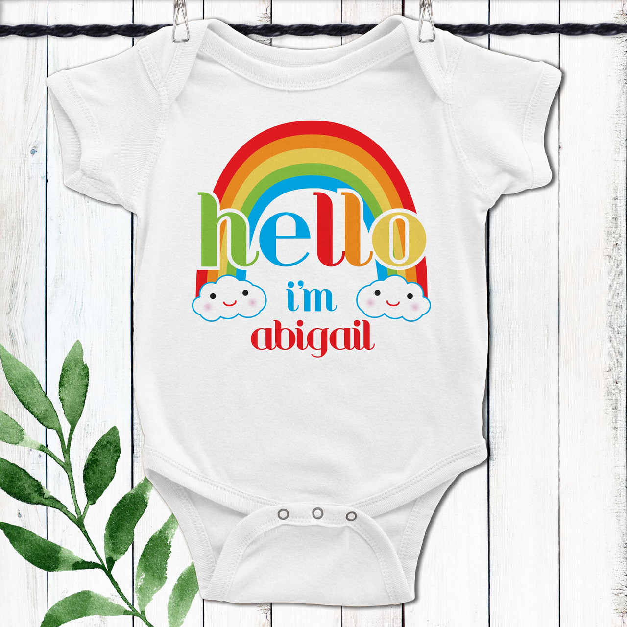 https://cdn11.bigcommerce.com/s-5grzuu6/images/stencil/1280x1280/products/4977/52827/Hello-Sunshine-Rainbow_Personalized-Baby-Bodysuit_with_Name__79690.1675192999.jpg?c=2