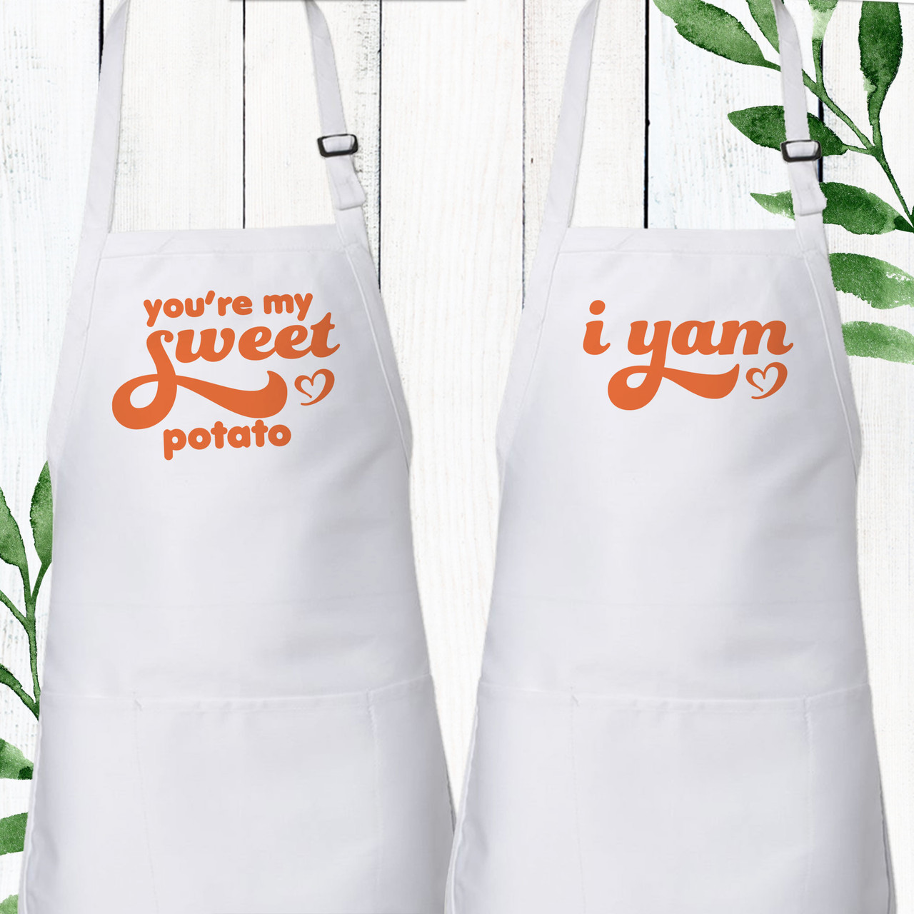 https://cdn11.bigcommerce.com/s-5grzuu6/images/stencil/1280x1280/products/5841/43287/Sweet-Potato-Yam_Thanksgiving_Adult_Aprons-Set__49820.1633822279.jpg?c=2