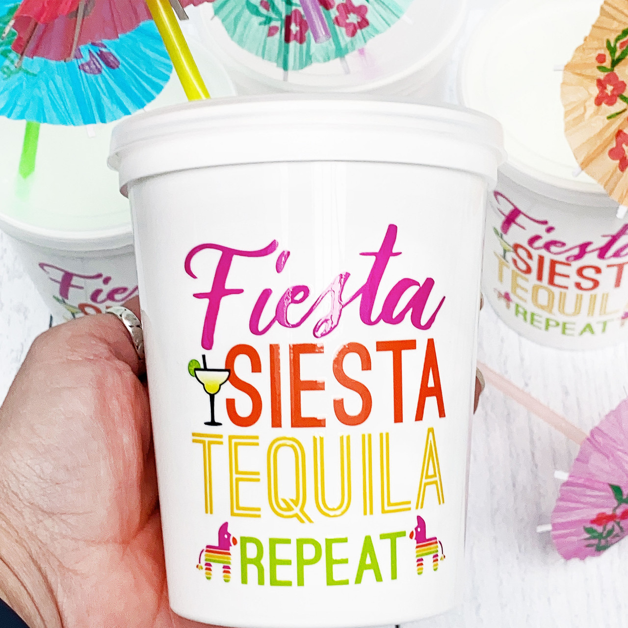 https://cdn11.bigcommerce.com/s-5grzuu6/images/stencil/1280x1280/products/6476/52265/Fiesta-Siesta_Tequila_16_oz_Plastic_Stadium_Cups__15675.1681854901.jpg?c=2