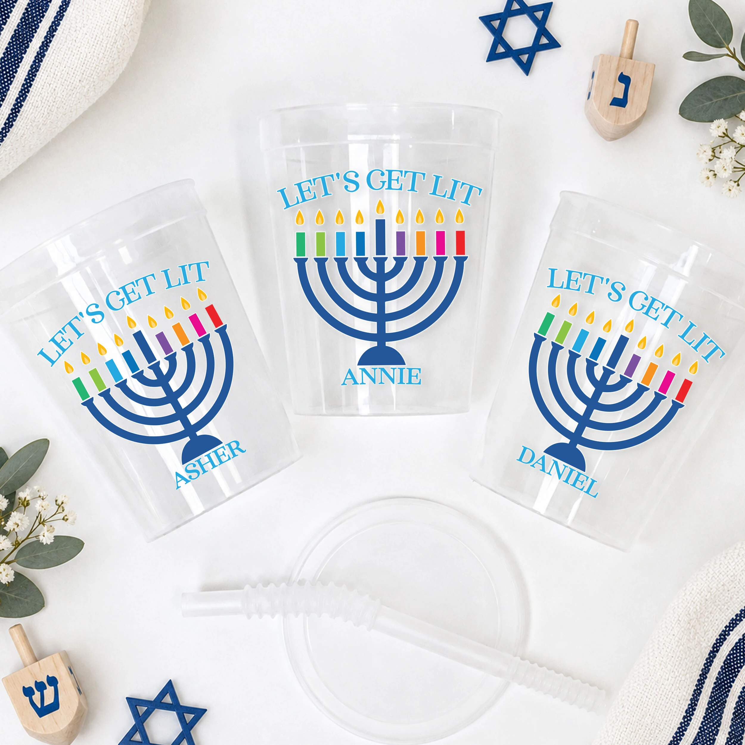 Personalized Hanukkah party supplies including drinkware napkins favor bags and labels