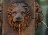 58" Milano Urn Lion Fountain (shown here in Revel Brown ) Comes with everything you need including the Pump Kit with instructions (Kit P22502 includes: 1 - KING 225 (225 gallon per hour pump) 1 - 1/2" plastic tee 1 - rubber stopper 1 - 1/2" plastic ell 1 – hose clamp 1 - 36" long piece of 1/2" clear tubing.) Also available in Pearl White, Natural, Old Stone or Classic Iron