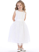 This communion dress is tea length.  Dress is made of tulle with sequins. Made in the USA!  This style is available in regular and half sizes. Made in the USA. Three Dress Limit PER ORDER!