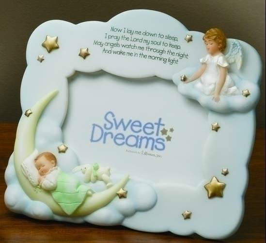 7" Sweet Dreams Guardian Angel Photo Frame holds a 3.5"x 5" photo. Resin and stone mix. dimensions:  7.125"H x 7.25"W
 