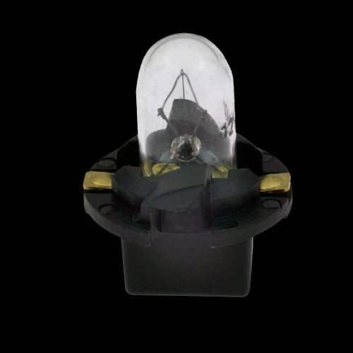 Close up the the complete dash bulb with the socket. Close up the the complete dash bulb with the socket.