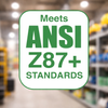 ANSI Z87+ standards compliance graphic on blurred warehouse background