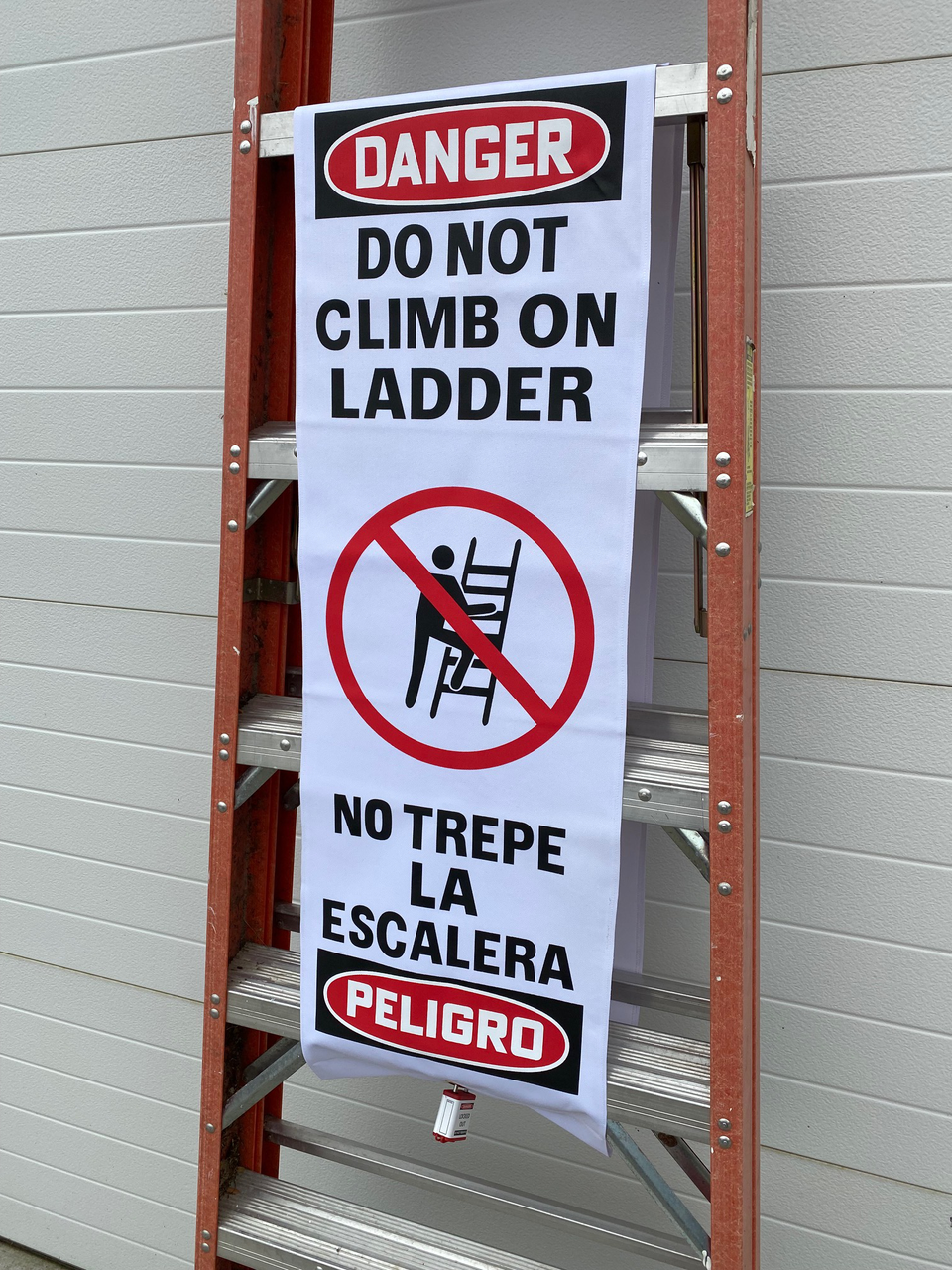 Ladder Lockout Cover Wrap with Lockout Padlock - Left Angled View Ladder Lockout Cover Wrap with Lockout Padlock - Left Angled View