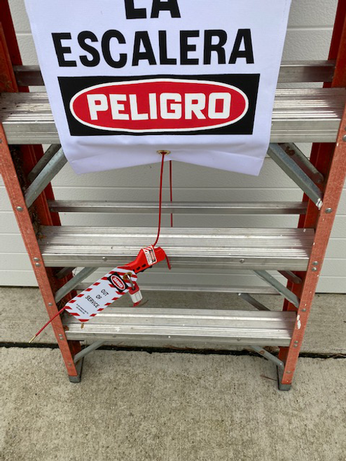 Ladder Lockout Cover Kit - close up view of ladder with sign connectors