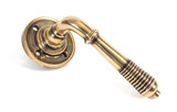 From The Anvil Reeded Lever Door Handle - Round Rosette - 60mm - Aged Brass