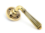 From The Anvil Hinton Lever Door Handle - Round Rosette - 60mm - Aged Brass