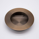 Manovella Round Sliding Door Flush Pull - 65mm - Aged Brass