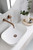 Meir Curved Wall Mounted Bath or Basin Outlet - Fixed Spout - Champagne