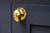 From The Anvil Oval Cabinet Knob with Backplate - Unlacquered Polished Brass