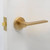 Manovella Hamilton Lever Door Handle - Round Rosette - 57mm - Satin Brass