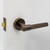 Manovella Rosedale Lever Door Handle - Round Rosette - 57mm - Aged Brass