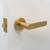 Manovella Fairhaven Lever Door Handle - Round Rosette - 57mm - Satin Brass