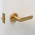 Manovella Fairhaven Lever Door Handle - Round Rosette - 57mm - Satin Brass