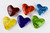 Grouping of Six Colorful Cast Glass Heart Paperweights