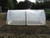 A fully assembled mini poly tunnel kit