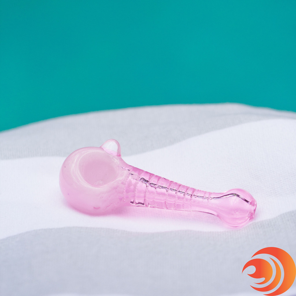 The 3" pink glass pipe has a beautiful white swirl chamber with a frosty cloud like bowl from AtomicBlaze.com - the best online smokeshop.