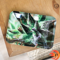 An easy-to-use rolling small metal tray with a leaf print and the Atomic Blaze online smokeshop logo for mess-free rolling.